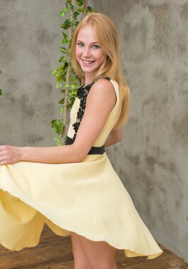 Mischievous Russian cutie in yellow dress wears no bra and panties