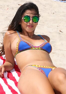 After tanning on the beach, Latina oils herself in the hotel and meets a dick