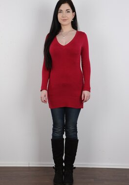 Adorable brunette with long hair demonstrates perky boobs and not only
