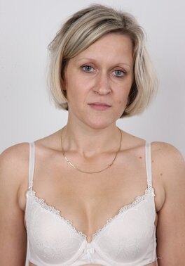 Blonde mature woman in jeans and white lingerie doesn't protect her privacy
