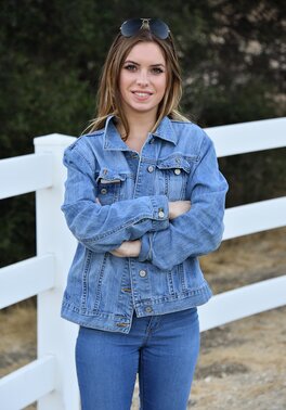 Model in blue jeans and jacket loves flashing her small boobs on camera