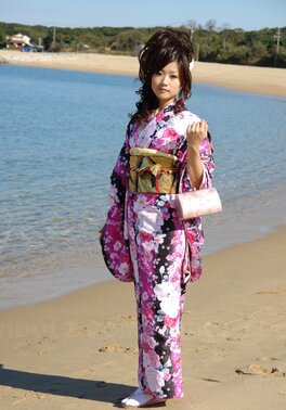 Asian slut knows her business and walks down the ocean shore attracting boys