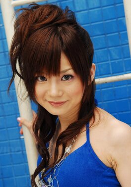 Skinny Japanese teen poses on cam somewhere in private swimming pool