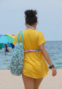 Black chick with curly hair gives up and allows photographer to spy on her