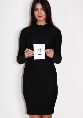 Beautiful tall model disrobes tight black dress to show up on the camera