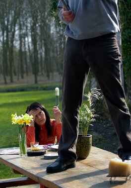 Girl in an orange overalls makes it with mustachioed homeowner outdoors