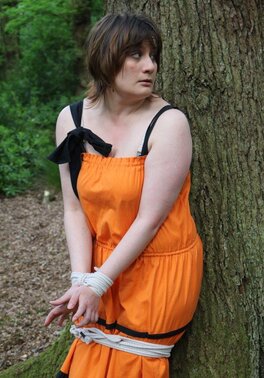 Helpless housewife is captured by lover and tied up to tree in public park
