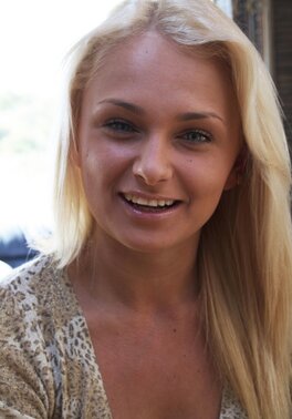 Sweet Russian girl strips to her blouse exposing small perky breasts