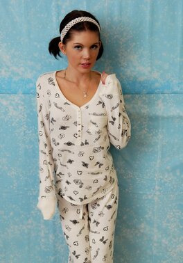 Teen wears a pajama and guys can only fantasize what is hidden beneath