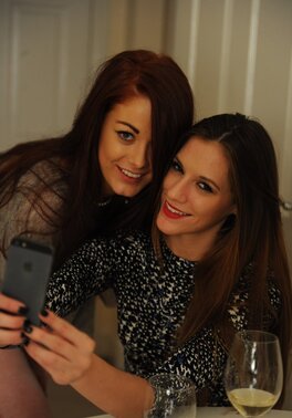 Lovely besties get drunk and horny enough to take topless selfies in the kitchen