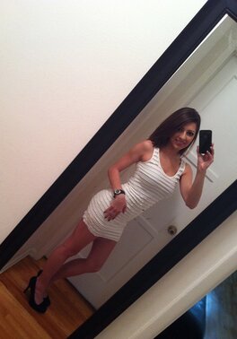 Luscious brunette chick is ready to pull clothes off to show tits and cunny