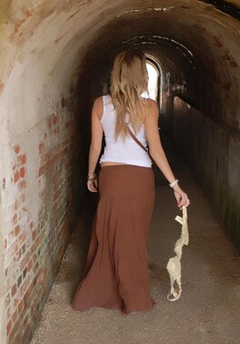 Totally shameless blonde flashing her tits and butt while taking a walk