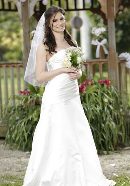 Beautiful bride discards wedding dress to expose her luscious young body