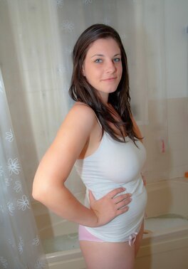 Confident brunette is here to show breasts and smile for the cam