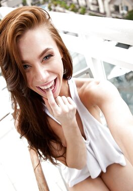Anya Olsen showcasing her sexy feet and nice body on the balcony