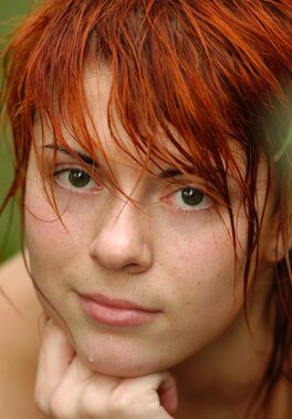 Redhead with perky nipples is getting wet while showering