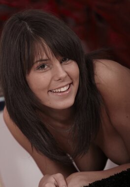 Brunette solo girl Melanie Memphis enjoys being all tease in a softcore shoot