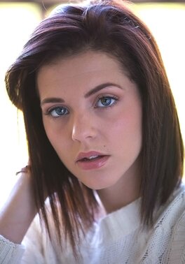 Thoughtful teen Kiera Winters takes off white sweaters and panties on the balcony
