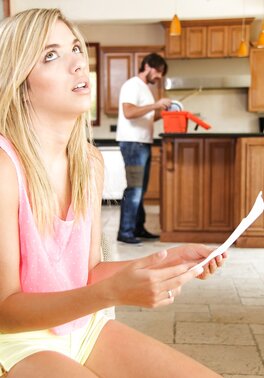 Charming blonde teen seduces handsome plumber at the kitchen while she's alone