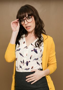 Modest office worker reveals sexy lingerie hidden under her usual outfit