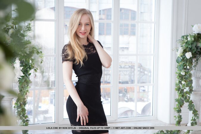 22-year-old Russian nude model gets comfortable and strips with ease on the sofa