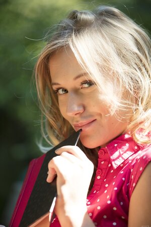 Blonde in summer dress found quiet place in the park to masturbate on the bench
