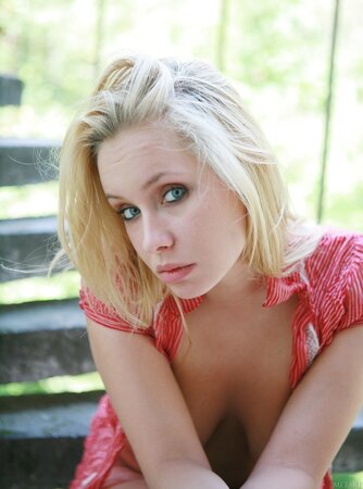 Blonde with sexy eyes, saggy hot tits walks naked around the abandoned building