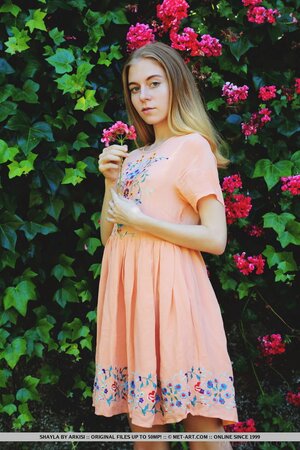 Attractive teen with skinny legs likes to show her body in the garden