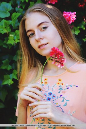 Attractive teen with skinny legs likes to show her body in the garden