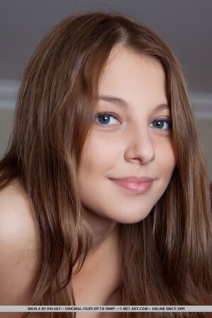 Nice small-tittied Russian young woman Nikia A sheepishly bares her body