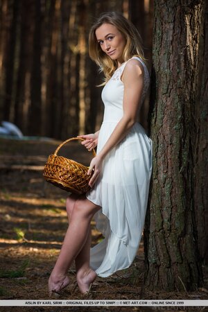Cameraman takes pictures of sexy flame in white dress who gets completely naked