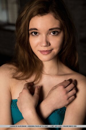 Teen slips off the sexy blue body to show bald pussy and small breasts