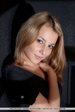 Girl with nice titties under a black shirt agrees to expose them and pussy