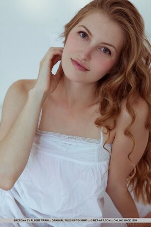 Arousing whore has some nerve arranging naked photo shoot and hugs a pillow