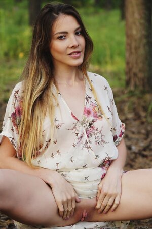 Ukrainian gal chooses a secluded place in the forest and starts playing with twat