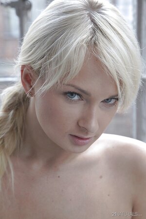 Platinum-haired babe Ivana Sugar answers a couple messages and poses naked