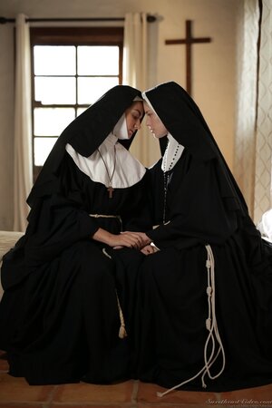 Blonde lesbian nun realizes that she is very sinful and asks for redemption