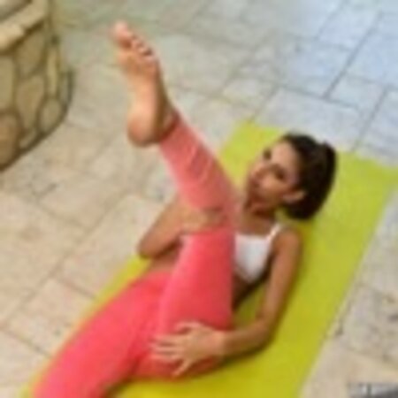 Beautiful chick asks a friend to film her yoga session and rewards him with sex