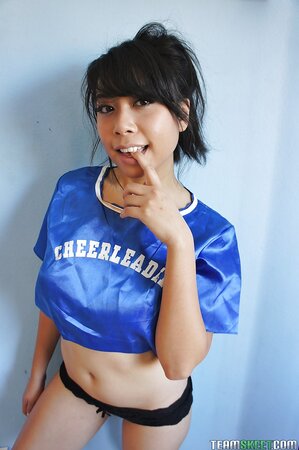 Exotic cheerleader instead practicing moves relaxes completely naked