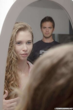 Splendid girl is combing hair when sweetheart comes and they enjoy sex