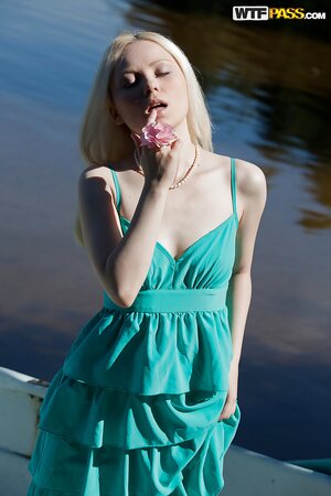 Blonde chick Mya Diamond undresses and masturbates right on the boath