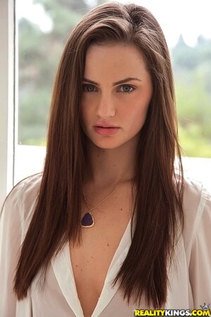 Pretty babe in a white shirt goes to the bathroom to wash her sexy buttocks