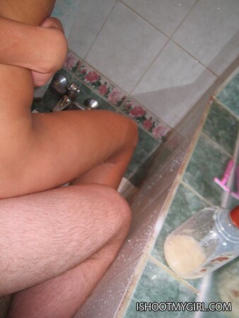 Skinny girl Tanya picked on phone camera showing how she loves sex in shower