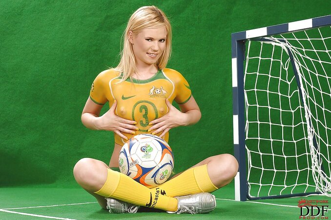 Football girl wears no outfit but just paint on her body instead of uniform