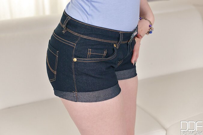 Redhead in blue lingerie likes the way pubic topiary looks and shows it to all