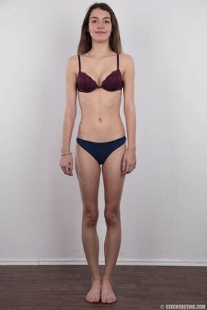 Girl with happy smile can't hide emotions at her very first XXX photosession