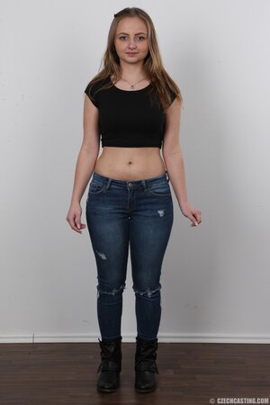 Young woman understands she can't hide from camera and has to pose in the nude