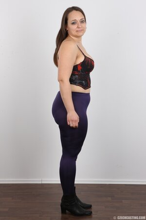 Woman turns photoshoot into dirty striptease exposing different-shaped tits