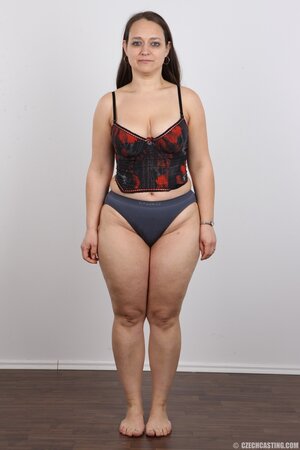 Woman turns photoshoot into dirty striptease exposing different-shaped tits