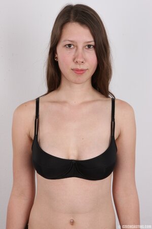 Young woman from village has come to town to be a XXX model stripping on camera